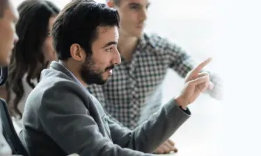 Bachelor of Science in Information Technology IT Holder Leading Team Discussion